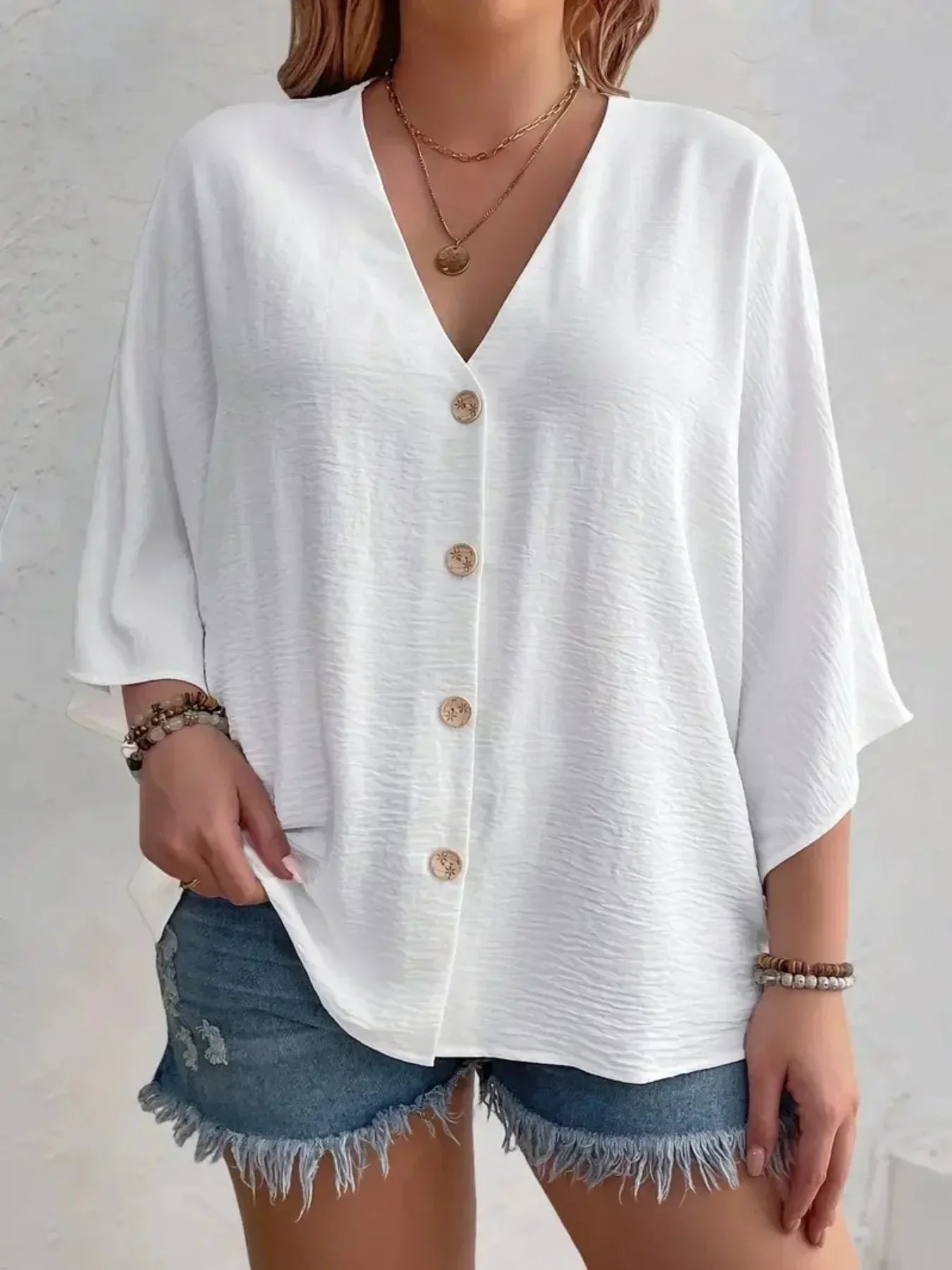 Elin | Signe – Blus med knäppning och ¾-ärm